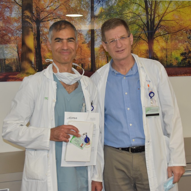 ד"ר אמנון איתן ופרופ' אבינעם שירן לאחר הענקתו של כתב המינוי